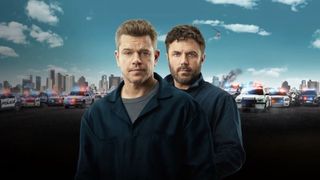 A teaser image for the movie The Instigators, with Matt Damon and Casey Affleck standing together with several police cars behind them