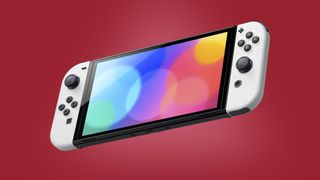 Nintendo Switch OLED -konsoli punaisella taustalla