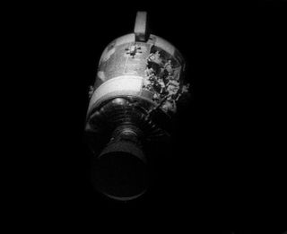 A view of the damaged Apollo 13 service module after separation.