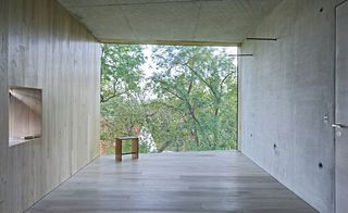 bench in front of a large window frame