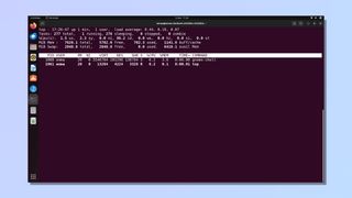 screenshot showing how to find CPU utilization in Linux - top -i