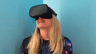 A photo of Becca wearing the Oculus Quest