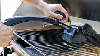 BBQ Daddy Grill Brush used to clean grill.