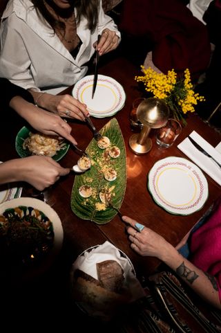 Guests dining at Mimosa at The Langham