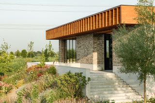 rotterdam house exterior corner out of stone and wood