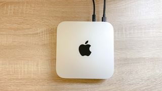 Mac mini M2 on a desk, viewed top-down