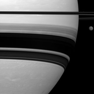 Cassini photo of Saturn, its rings and the moon Titan