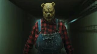 Winnie the Pooh in overalls in Winnie the Pooh: Blood and Honey 2