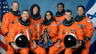 NASA crew portrait of Space Shuttle Columbia STS-107 crew. Seated in the front, from left, are: Astronauts Rick D. Husband, mission commander; Kalpana Chawla, mission specialist; and William C. McCool, pilot. Standing, from left, are: David M. Brown, Laurel B. Clark, and Michael P. Anderson, all mission specialists; and Ilan Ramon, payload specialist, representing the Israeli Space Agency.