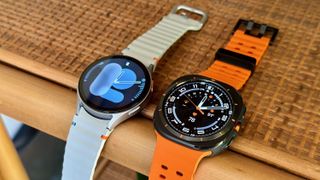 The Samsung Galaxy Watch 7 (left, silver) and Samsung Galaxy Watch Ultra (right, black) side-by-side