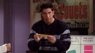 David Schwimmer reading a question in Friends.