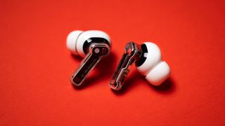 Nothing Ear (2) earbuds review on red background