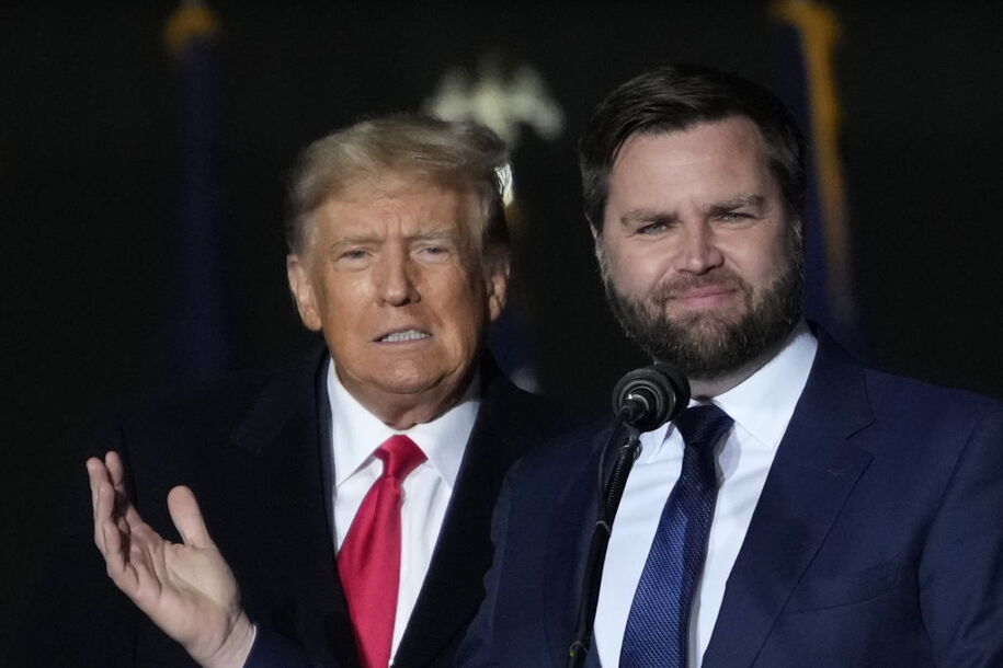 VANDALIA, OHIO - NOVEMBER 07: Former U.S. President Donald Trump and Republican candidate for U.S. Senate JD Vance greet supporters during the rally at the Dayton International Airport on November 7, 2022 in Vandalia, Ohio.Â Trump campaigned at the rally for Ohio Republican candidates including Republican candidate for U.S. Senate JD Vance, who is running in a tight race against Democratic candidate for U.S. Senate Rep. Tim Ryan (D-OH). (Photo by Drew Angerer/Getty Images)