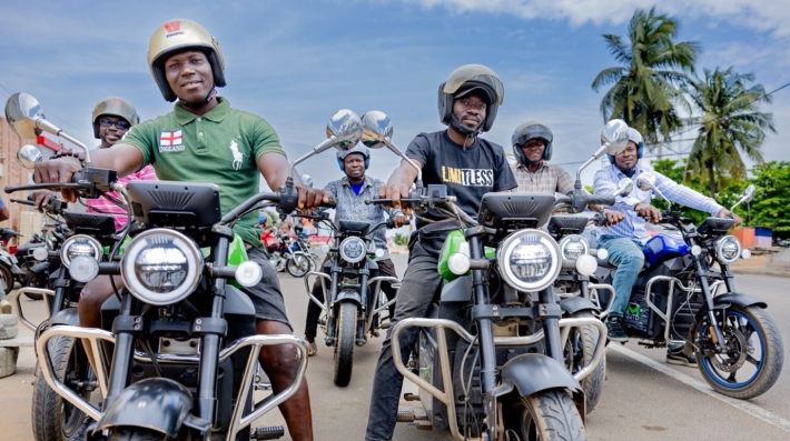 people riding electric motorbikes