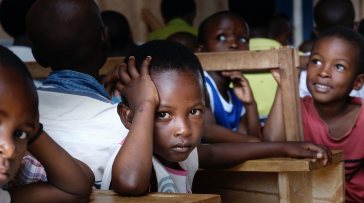 Ugandan student finding it too hard to study. This was taken at a GODLOVESKIDS.com location in Nakasaki (nuh kasa kee) school district. Kampala, Uganda