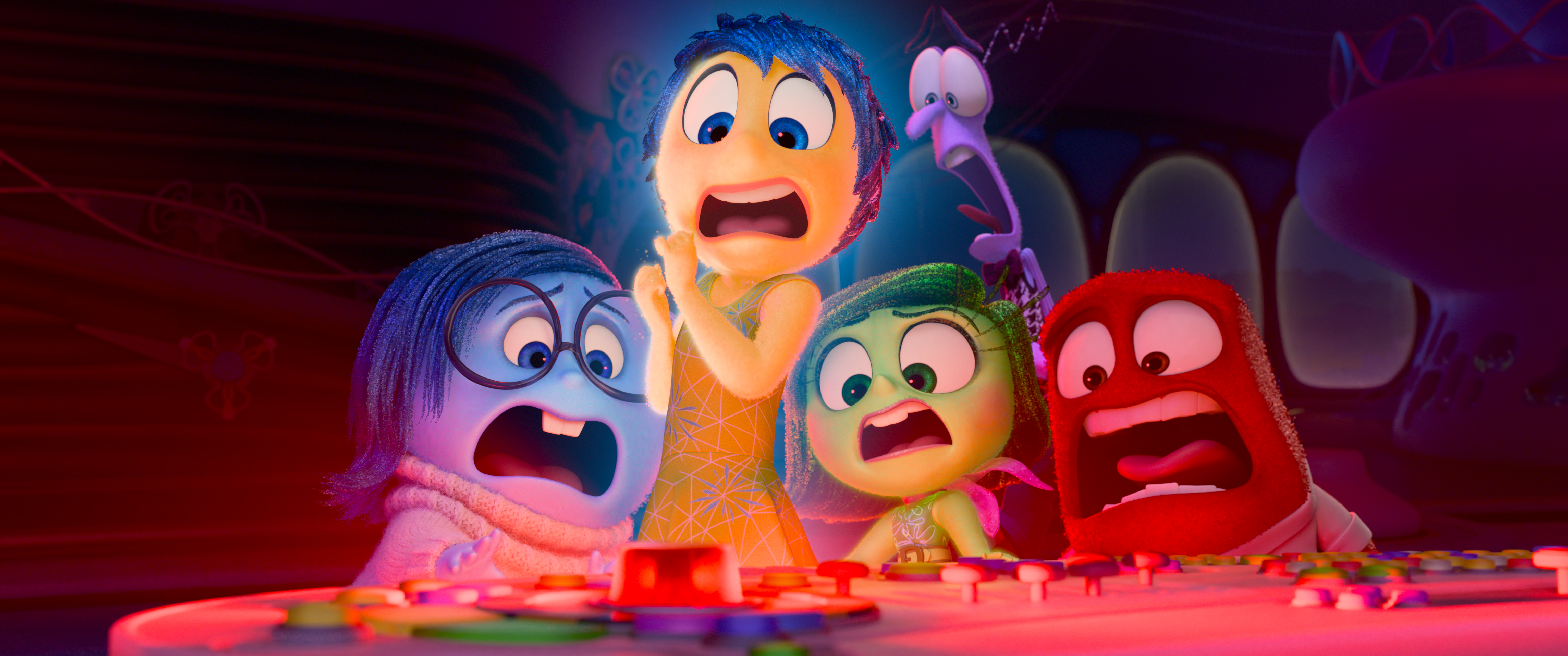 The emotions of Inside Out all freaking out as the big red puberty button goes off