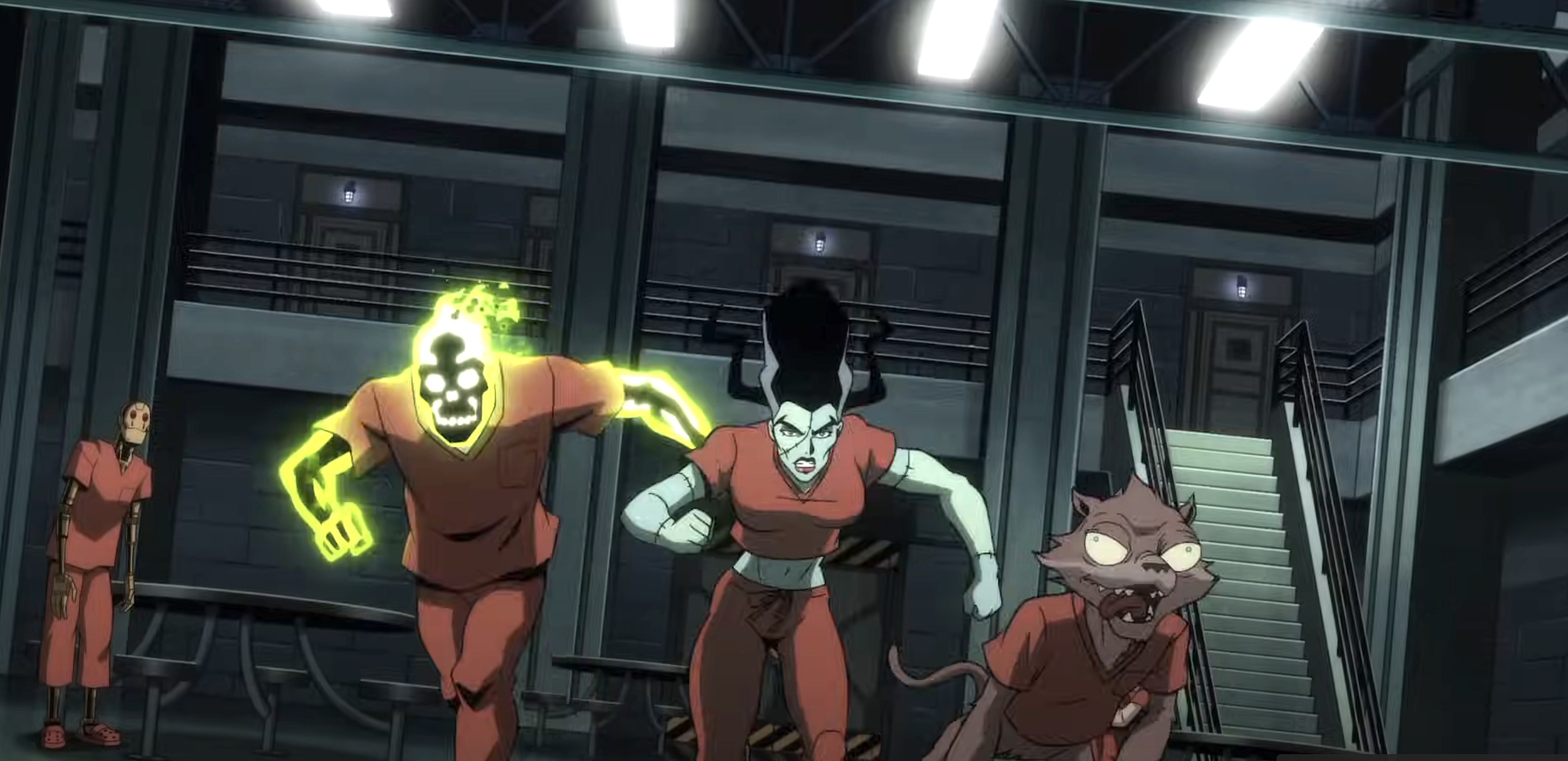 Doctor Phosphorus, Bride of Frankenstein, and Weasel, all wearing orange prison jumpsuits, rush at the screen as G.I. Robot, in a matching jumpsuit, stands curiously behind them in the first trailer for James Gunn’s Creature Commandos
