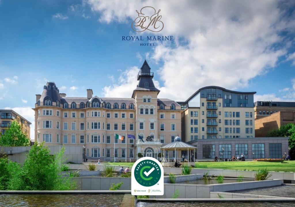 a large building with a sign in front of it at Royal Marine Hotel in Dun Laoghaire