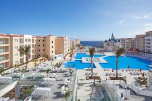 an aerial view of a resort with a swimming pool at Bahia Principe Fantasia Tenerife - All Inclusive in San Miguel de Abona