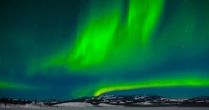 The Aurora Borealis: Excited oxygen atoms emit green light.