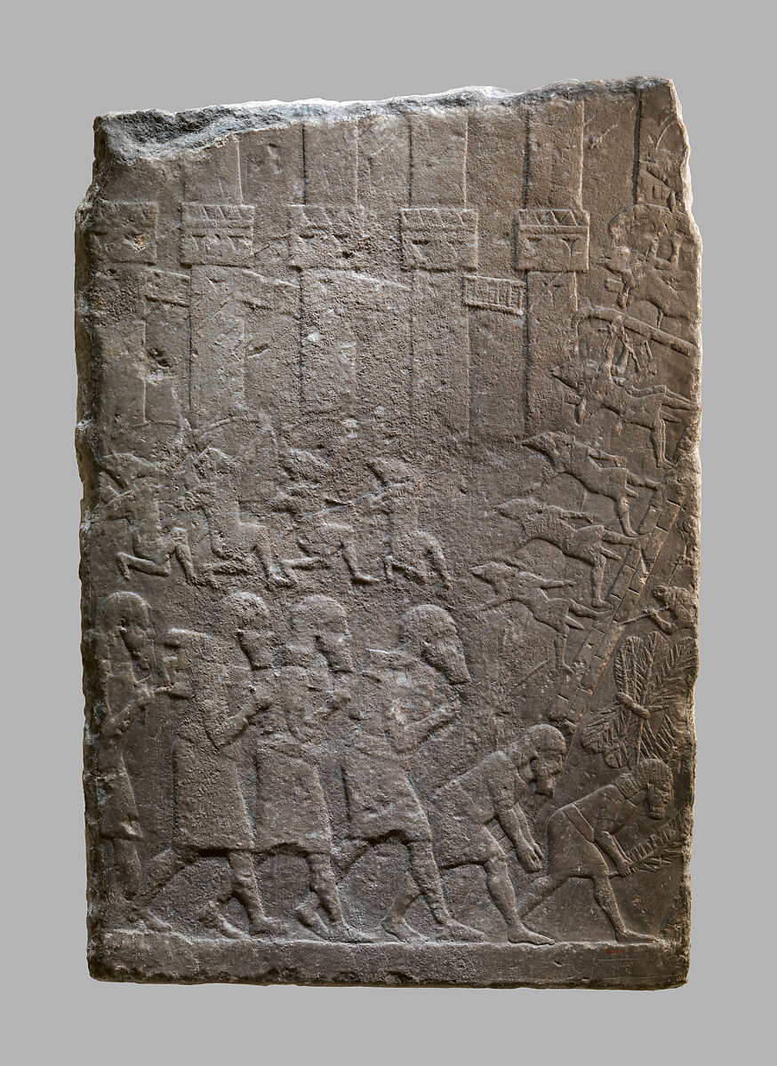 Battle scene of Assyrians storming a citadel