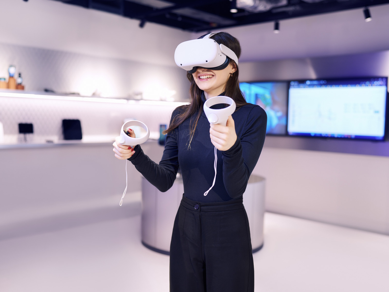 Woman using a VR headset in our white room