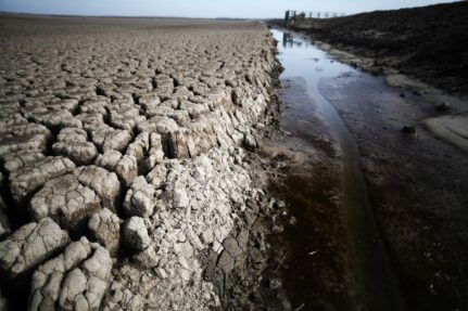 A significantly dried up bank where sediment runoff comes from.