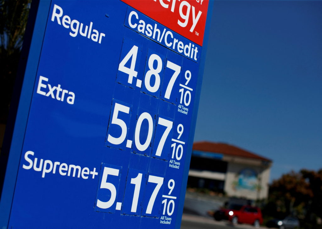 FILE PHOTO: Gas prices grow along with inflation as this sign at a gas station shows in San Diego