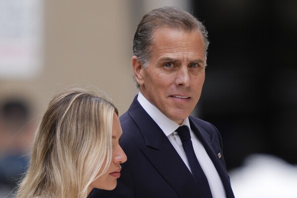 Hunter Biden, accompanied by his wife, Melissa Cohen Biden, arrives to federal court on hearing there is a verdict, Tuesday, June 11, 2024, in Wilmington, Del (AP Photo/Matt Rourke)