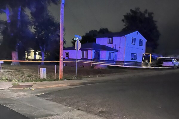 This photo provided by the Commerce City Police Department shows the scene of a fatal shooting on Friday, Aug. 9, 2024, in Commerce City, Colo. (Commerce City Police Department via AP)