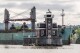 A ship passes the Hudson Athens Lighthouse, Wednesday, June 12, 2024, in Hudson, N.Y. The 150-year-old lighthouse is in danger of toppling into the water, and advocates for the lighthouse in the middle of Hudson River are urgently trying to save it. (AP Photo/Julia Nikhinson)