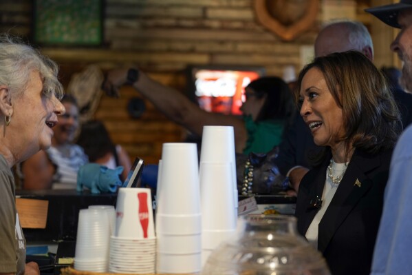 Democratic presidential nominee Vice President Kamala Harris talks as she visits SandFly Bar-B-Q in Savannah, Ga., Wednesday, Aug. 28, 2024. (AP Photo/Jacquelyn Martin)