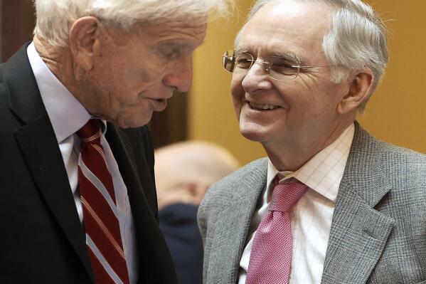 FILE - Virginia Senate Majority Leader Richard Saslaw, left, D-Fairfax, and Senate Minority Leader Tommy Norment Jr., R-James City, have a word during a session of the Virginia Senate in the state Capitol in Richmond, Va., Jan. 24, 2023. Over a dozen Virginia legislators, including the long-tenured Norment, have recently ruled out seeking re-election this year under maps overhauled during the latest redistricting cycle. (Alexa Welch Edlund/Richmond Times-Dispatch via AP, File)