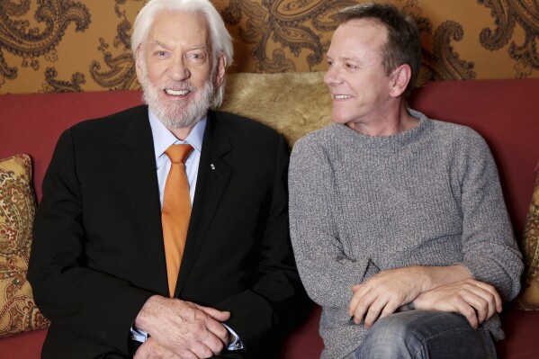 FILE - Donald Sutherland, left, and his son Kiefer Sutherland pose for a portrait in Los Angeles to promote the film "Forsaken." Donald Sutherland, the towering Canadian actor whose career spanned "M.A.S.H." to "The Hunger Games," has died at 88. (Photo by Matt Sayles/Invision/AP, File)