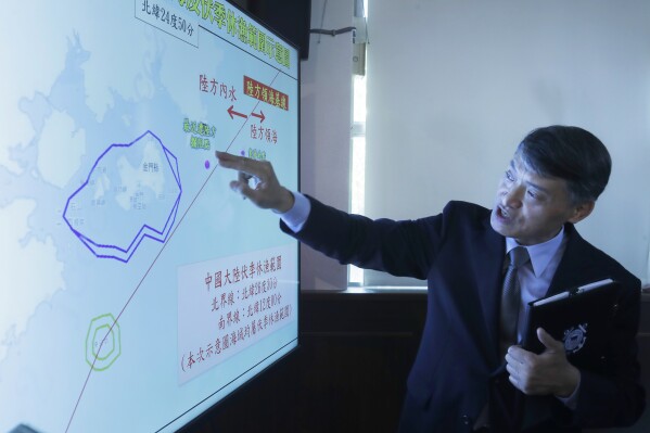 Coastal Control Division Chief Liao Yun-Hung talks about a fishing boat intercepted by Chinese vessels Tuesday night, during a news conference in Taipei, Taiwan, Wednesday, July 3, 2024. Taiwan is calling for the release of a fishing boat after it was boarded by China''s coast guard and steered to a port in mainland China on Tuesday. (AP Photo/Chiang Ying-ying)