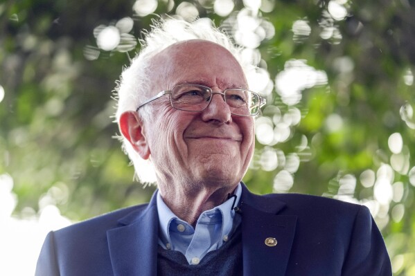 FILE - Sen. Bernie Sanders, I-Vt., smiles as he addresses Unite Here Local 11 workers holding a rally, April 5, 2024, in Los Angeles. (AP Photo/Damian Dovarganes, File)