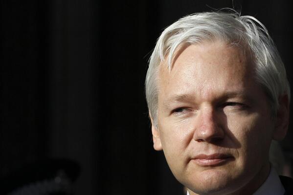 FILE - WikiLeaks founder Julian Assange pauses as he makes a statement to media gathered outside the High Court in London, on Dec. 5, 2011. Australia’s Prime Minister Anthony Albanese said Wednesday, Nov. 30, 2022, he recently told U.S. President Joe Biden’s administration to bring WikiLeaks founder and Australian citizen Julian Assange’s prosecution to a close. (AP Photo/Kirsty Wigglesworth, File)