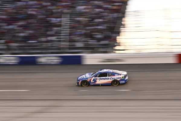 Kyle Larson steers through Turn 4 during a NASCAR Cup Series auto race at Darlington Raceway, Sunday, Sept. 1, 2024, in Darlington, S.C. (AP Photo/Matt Kelley)