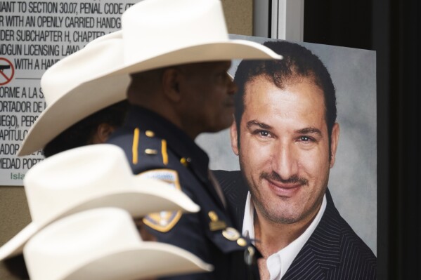 An image of Harris County Precinct 4 Deputy Constable Maher Husseini is displayed following his funeral prayers at Masjid Al Salem Mosque, Thursday, Sept. 5, 2024, in Spring, Texas. (Jon Shapley/Houston Chronicle via AP)