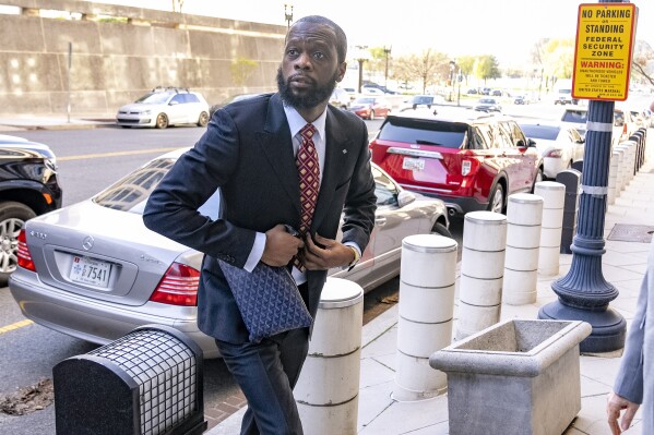 Prakazrel "Pras" Michel, a member of the 1990s hip-hop group the Fugees, arrives at federal court April 3, 2023, in Washington. (AP Photo/Andrew Harnik, File)