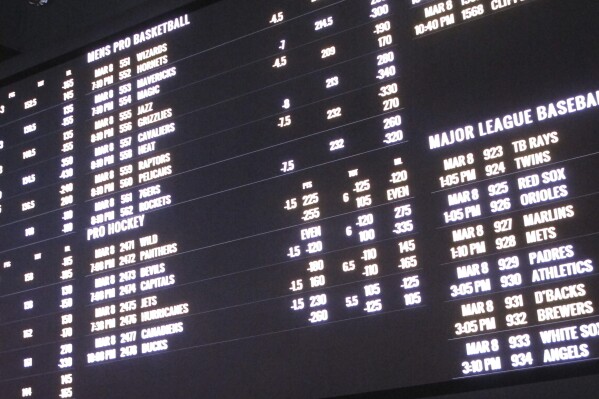 Odds for various sporting events are posted in a casino sports book in Atlantic City N.J. on March 8, 2019. On Aug. 2, 2024, (AP Photo/Wayne Parry)