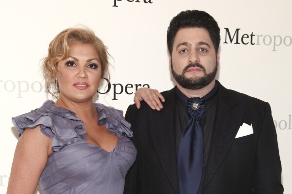 FILE - Anna Netrebko, left, and Yusif Eyvazov, right, attend The Metropolitan Opera's 50th anniversary at Lincoln Center celebration on Sunday, May 7, 2017, in New York. Netrebko and Eyvazov have separated. The couple, who married in 2015, say in a statement: “After 10 happy years together, we have made the difficult but amicable decision to separate.” (Photo by Andy Kropa/Invision/AP, File)