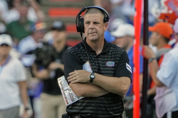 Florida head coach Billy Napier paces the sideline during the second half of an NCAA college football game against Miami, Saturday, Aug. 31, 2024, in Gainesville, Fla. (AP Photo/John Raoux)