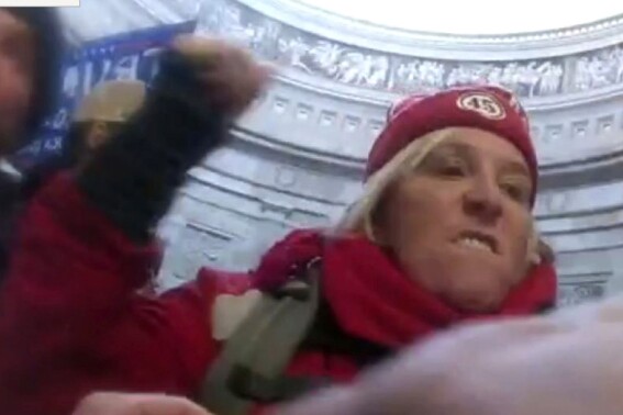 This image from U.S. Capitol Police body-worn video that was in the government sentencing memorandum in the case, shows Jacquelyn Starer, a physician from Massachusetts, striking a police officer in the Rotunda of the U.S. Capitol on Jan. 6, 2021, in Washington. (U.S. Capitol Police via AP)