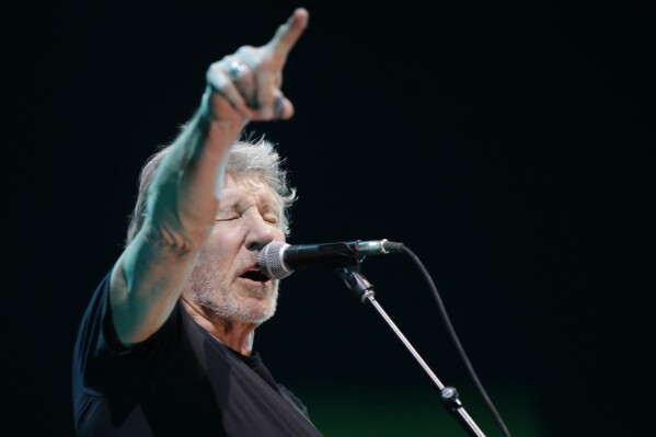 FILE - Roger Waters performs during a live concert in Assago, near Milan, Italy, Wednesday, April 18, 2018. Hotels in Argentina and Uruguay have reportedly rejected reservations for Pink Floyd co-founder Waters over accusations of antisemitism leveled at the British singer known for his pro-Palestinian views. The Argentine newspaper Pagina 12 says Waters was due to stay in Buenos Aires ahead of shows Nov. 21-22, 2023, as part of his “This is Not a Drill” tour, but the reservations fell through. (AP Photo/Luca Bruno, File)