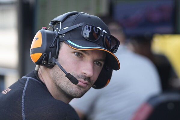 FILE -Alexander Rossi watches during a practice session for the IndyCar Indianapolis GP auto race at Indianapolis Motor Speedway, Friday, Aug. 11, 2023, in Indianapolis. Arrow McLaren Racing is making yet another change to its IndyCar lineup and will replace Alexander Rossi with Christian Lundgaard. Rossi spent last season and this with McLaren, while Lundgaard, of Denmark, has been with Rahal Letterman Lanigan. (AP Photo/Darron Cummings, File)