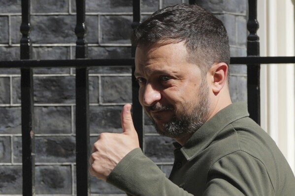 Ukraine's President Volodymyr Zelenskyy leaves Downing Street after meeting with Britain's Prime Minister Keir Starmer in London, Friday, July 19, 2024. (AP Photo/Kin Cheung)