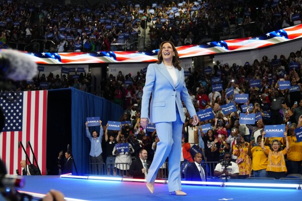 Vice President Kamala Harris admires the crowd during a campaign rally, Tuesday, July 30, 2024, in Atlanta. (AP Photo/John Bazemore)