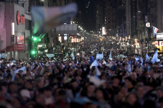 Argentina fans gather on the street after their team defeated Colombia at the Copa America final soccer match in Buenos Aires, Argentina, Monday, July 15, 2024. (AP Photo/Rodrigo Abd)