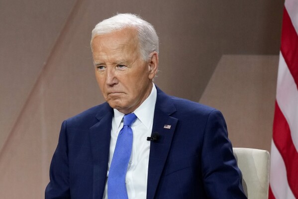 FILE - President Joe Biden attends an event on the sidelines of the NATO Summit in Washington, July 11, 2024. Insiders who were close to Joe Biden's struggles are describing a president who was dogged in his determination to keep his candidacy alive, but ultimately not in denial about the odds. A number of firsthand observers of Biden's crisis say he was privately contemplative during his days of decision, before announcing Sunday, July 21, that he was quitting the presidential race. (AP Photo/Susan Walsh, File)